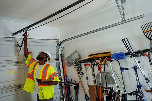 Professional Garage Door Installation technician working in New Smyrna Beach, FL